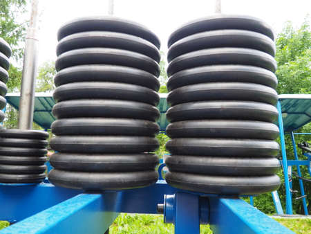 Outdoor sports simulators. Equipment for sports in a public place. The concept of a healthy lifestyle and physical culture. Metal and rubber partsの写真素材