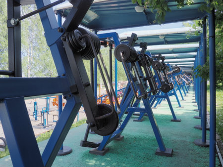 Petrozavodsk, Russia 26 June 2021. Outdoor sports simulators. Equipment for sports in a public place. The concept of a healthy lifestyle and physical culture. Metal and rubber parts.のeditorial素材