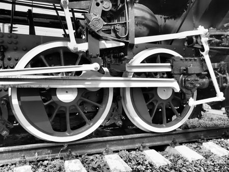 Retro train two wheels. Sleepers and rails, mechanisms, pistons and guides. Locomotive of the 19th...