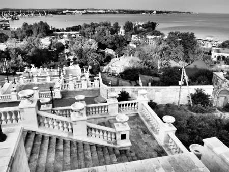 Kerch, August 21, 2021 The Great Mithridate Ladder - a historical staircase on the mountain peaks of Crimea - Mount Mithridates. Black and white photo. A white balustradeのeditorial素材