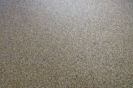 Gold close up. Golden glitter texture background. Sparkling glitter wrapping paper with sequins and...
