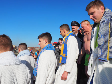 Sremska Mitrovica, Serbia, January 19, 2022. Christian holiday Epiphany. Mass bathing of people in...