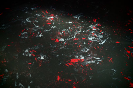 Black background with red, white, gray and blue strokes, dashes, stains and scuffs. A ray of light.の写真素材