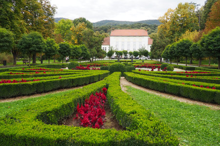 Banja Koviljaca, Serbia, Guchevo, Loznica Sept 30 2022 Rehabilitation center with sulfur and iron mineral waters. Landscape to the Kur-salon with grass, lawns, walking paths and flowers. Royal Palace.のeditorial素材