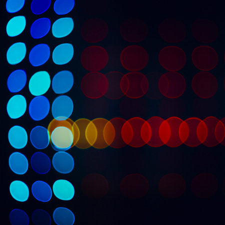 Multicolored abstract round bokeh - blue, white, yellow, orange, red. Bokeh is the blurring of an...