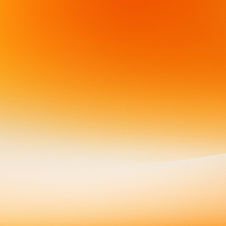 orange - white color gentle bright beautiful abstract gradient background with dark and light stains shadows and smooth lines. Delicate background or template for a greeting card or ad. Copy space.の写真素材