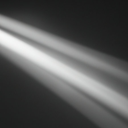 Ray light effects on black background for overlay design. Rays of light fall on empty space. Copy space. White gray beams.の写真素材