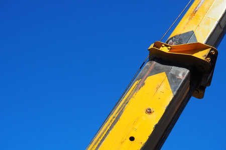 Hoisting crane, machines designed for the spatial movement of goods, the temporary engagement of which is carried out using lifting devices - hook hangers, load-handling bodies of a special designの写真素材