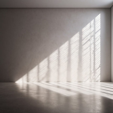 Brown beige wall and large window. Sunlight is streaming through window, casting long shadows on wall. Room is bright and airy, with clean, minimalist feel. Background for interior or product display.の素材