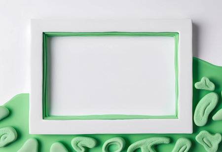 Rectangular frame in white with smooth green elements surrounding it creates a modern abstract background. The design features empty space, suitable for creative projects.の素材