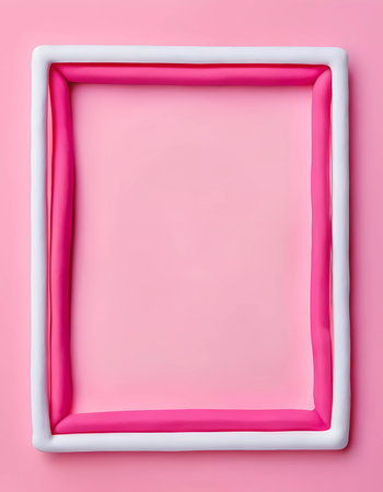 A rectangular space is bordered by vibrant play dough in white and pink colors, set against a soft pink background. This visual invites imagination and creativity.の素材