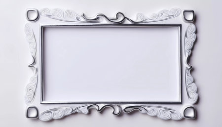 Ornate rectangular frame crafted with a light silver-grey finish, featuring intricate designs that enhance its decorative appeal for presentations.の素材