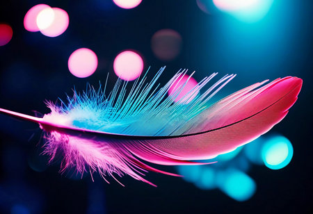 A delicate feather showcases an array of vivid colors, illuminated by bright lights, creating a mesmerizing atmosphere at a creative gathering.の素材