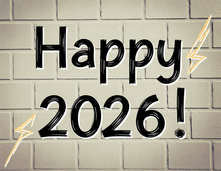 The wall displays bold messages wishing a happy 2026. Bright colors highlight the text against a neutral background. This setting is meant for new year festivities.の素材
