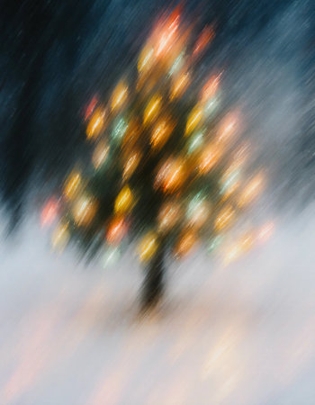 A Christmas tree stands in a snowy landscape. Bright lights twinkle on the tree as people gather around to celebrate. This scene captures the joy of the holiday season.の素材