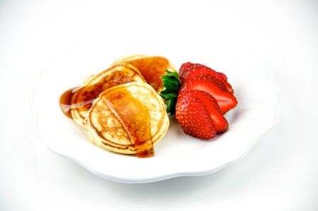 Silver Dollar Pancakes With Strawberry on a White Plateの写真素材