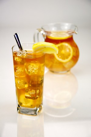 Pitcher of Iced Tea with a Glass of Ice Teaの写真素材
