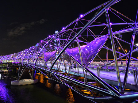 A photograph of the Helix Bridge in Marina Bay, Singapore