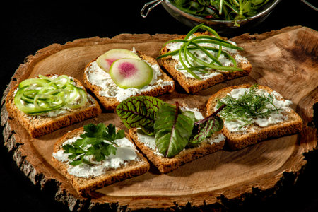 Top view, breads and cheese, green healthy vegetable appetizers.の写真素材