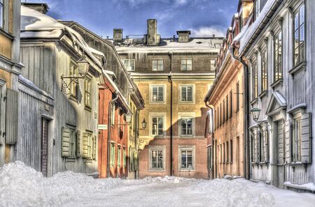 Old street in Stockholm in wintertime.の写真素材