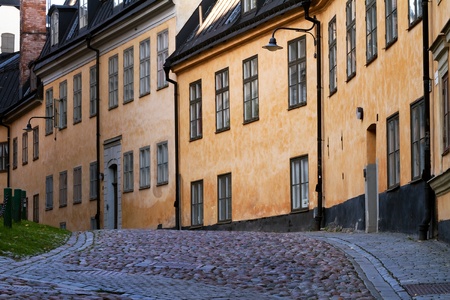 Cobblestone street with old buildings in Stockholm Sodermalm area.の写真素材
