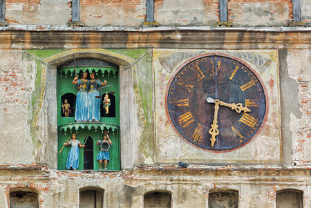 Ancient church clock with figurines.の写真素材