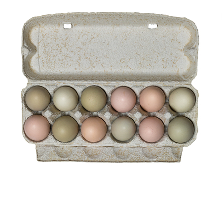 Egg carton with fresh organic eggs, isolated image.の写真素材