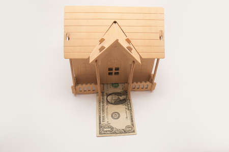 house on top of money by way of mortgageの写真素材