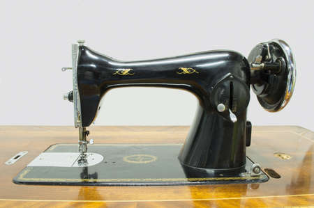 old sewing machine isolated with white Backgroundの写真素材