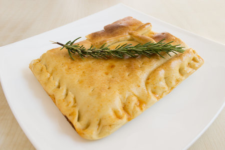 empanada  a typical dish from Galicia Spain with various ingredients inside