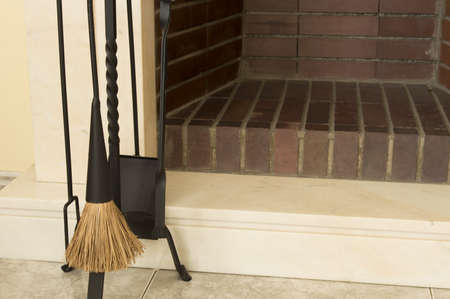 tools for cleaning fireplace in blackの写真素材