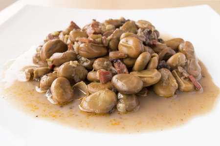 plate of beans with hamの写真素材