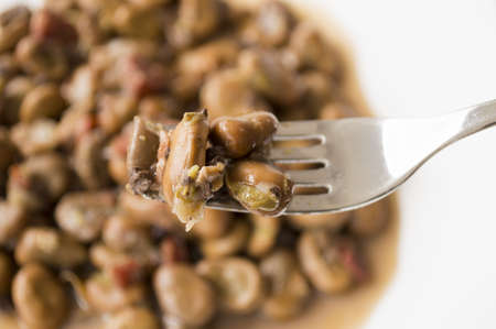 close up of a fork with beansの写真素材