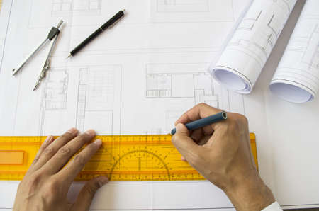 architect designing a plan of a houseの写真素材