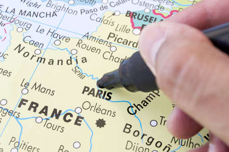 marking on a map next holiday destination in Parisの写真素材