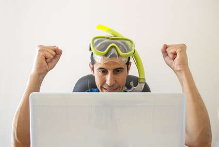 Man gets a great deal for your holiday at sea in internetの写真素材