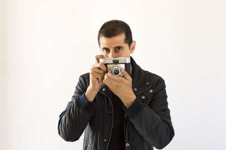 Photographer looking its target for the next shotの写真素材