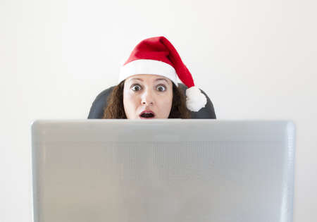 woman surprised by the offers on gifts and trips for the coming xmasの写真素材