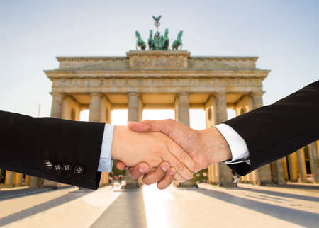 handshake of a woman and business men in Berlinの写真素材