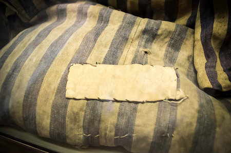 Closeup of old and dirty clothes of a prisoner