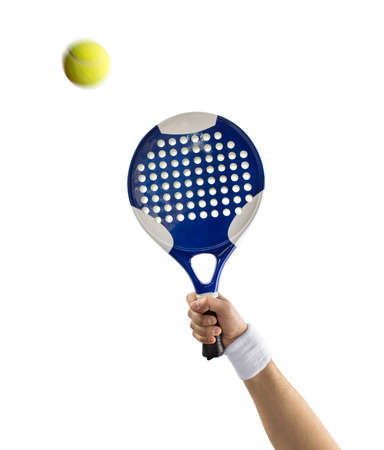 hand with a tennis paddle racket hitting a ball with background whiteの写真素材