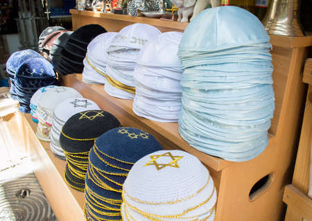 Collection of yarmulkes at Jerusalem market - traditional jewish hatsの写真素材