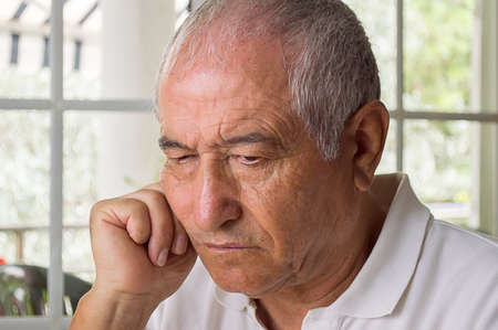 portrait of elderly man ost in thoughtの写真素材