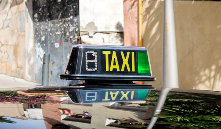 detail of a taxi cab in a Barcelona streetの写真素材