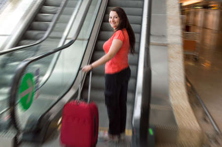tourist woman walking travel bagの写真素材