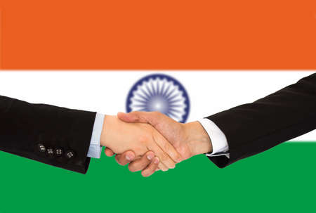 handshake of a woman and business men in Indiaの写真素材