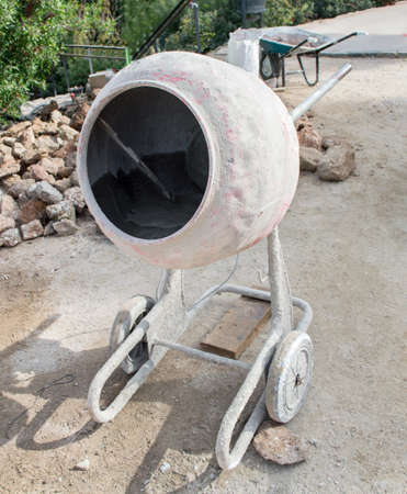 Shot of a cement mixer at a building siteの写真素材
