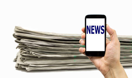 Modern smartphone with news and newspaper isolated on whiteの写真素材