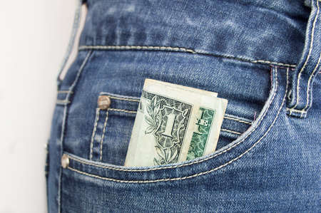 cropped  shot of a woman s pocket with dollar in itの写真素材