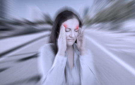 woman with severe headache with fraud in red zone